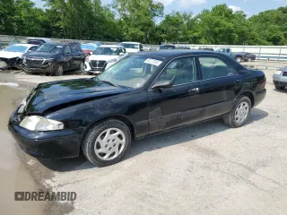 2001 Mazda 626 LX z VIN 1YVGF22CX15247881, wystawiony jako Copart lot #60272305 z przebiegiem 180 628 mil mil oraz Szkoda całkowita • Salvage title. Historia ofert i sprzedaży dostępna na DreamBid. Obrazek 1.