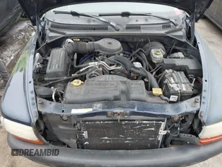 2002 Dodge Dakota Sport with VIN 1B7GL32X12S561414, listed as a IAAI auction lot 42060300 with 235,957 mi miles. Bid and sale history available at carsss.com. Image 10.