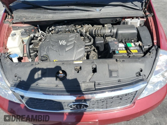 2011 Kia Sedona LX with VIN KNDMG4C75B6410550, listed as a Copart auction lot 76997744 with 74,659 mi miles and Salvage Title. Bid and sale history available at carsss.com. Image 13.