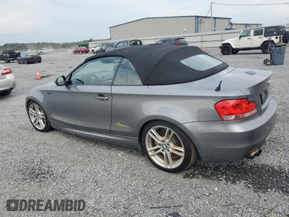 2012 BMW 1 Series 135i with VIN WBAUN7C59CVM26082, listed as a Copart auction lot 74711754 with 77,152 mi miles and Salvage title. Bid and sale history available at DreamBid. Image 2.