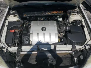 2004 Cadillac DeVille z VIN 1G6KD54Y44U226800, wystawiony jako Copart lot #61298895 z przebiegiem 108 211 mil mil oraz Szkoda całkowita • Salvage title. Historia ofert i sprzedaży dostępna na DreamBid. Obrazek 11.