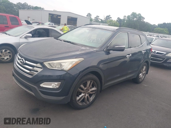 2013 Hyundai Santa Fe Sport z VIN 5XYZU3LAXDG064239, wystawiony jako IAAI lot #42296861 z przebiegiem 165 872 mil mil oraz . Historia ofert i sprzedaży dostępna na DreamBid. Obrazek 2.