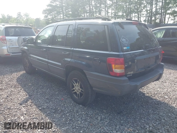 2004 Jeep Grand Cherokee Laredo with VIN 1J4GW48NX4C405558, listed as a IAAI auction lot 42440639 with 197,457 mi miles and . Bid and sale history available at DreamBid. Image 3.