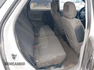 2002 Pontiac Aztek z VIN 3G7DA03E52S579681, wystawiony jako IAAI lot #42165625 z przebiegiem Nie podano mil oraz . Historia ofert i sprzedaży dostępna na DreamBid. Obrazek 8.