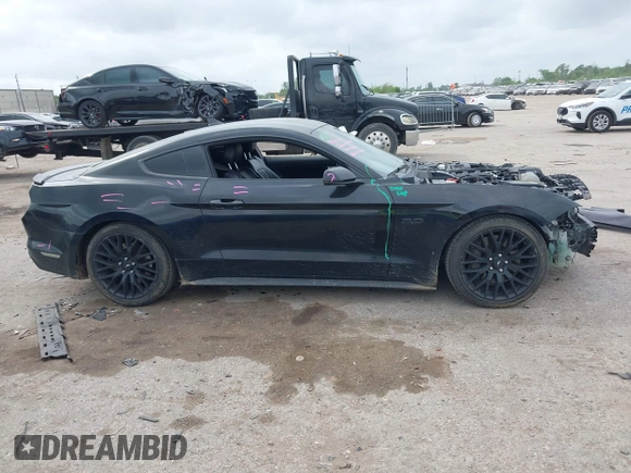 2021 Ford Mustang GT with VIN 1FA6P8CF8M5137318, listed as a IAAI auction lot 41934683 with 62,473 mi miles and . Bid and sale history available at DreamBid. Image 13.