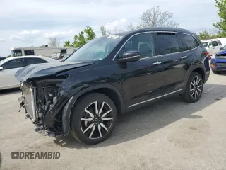 2020 Honda Pilot Touring 8-Passenger z VIN 5FNYF6H96LB022873, wystawiony jako Copart lot #54431825 z przebiegiem 101 493 mil mil oraz Szkoda całkowita • Salvage title. Historia ofert i sprzedaży dostępna na DreamBid. Obrazek 1.
