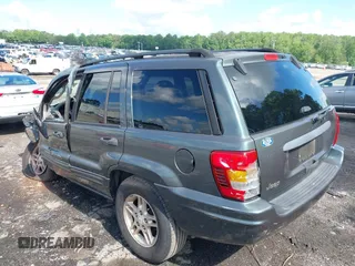 2004 Jeep Grand Cherokee Laredo with VIN 1J4GX48S34C192181, listed as a IAAI auction lot 42320368 with 181,415 mi miles and . Bid and sale history available at DreamBid. Image 3.