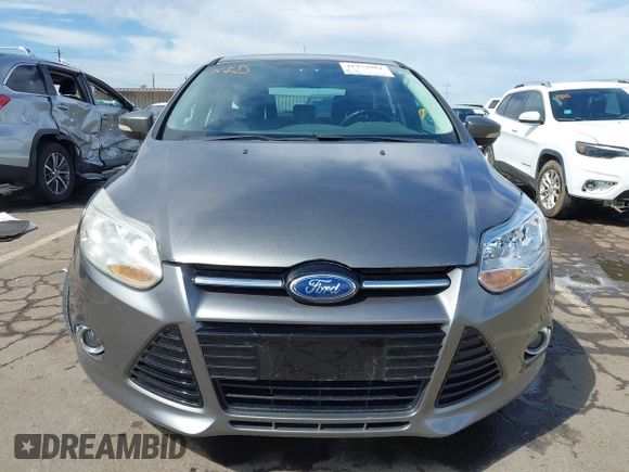 2012 Ford Focus SEL with VIN 1FAHP3M29CL314685, listed as a IAAI auction lot 41974881 with 167,119 mi miles. Bid and sale history available at carsss.com. Image 12.