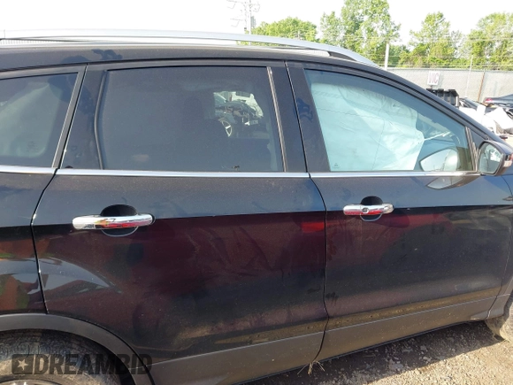 2018 Ford Escape Titanium with VIN 1FMCU9J95JUB30803, listed as a IAAI auction lot 42286536 with 63,309 mi miles and . Bid and sale history available at DreamBid. Image 14.
