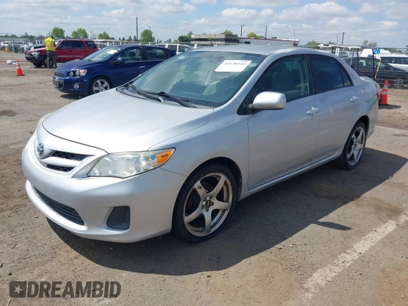 2011 Toyota Corolla L with VIN JTDBU4EE9B9156724, listed as a IAAI auction lot 42138344 with 96,486 mi miles and . Bid and sale history available at DreamBid. Image 2.