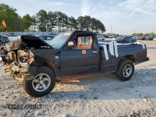 1989 GMC Sonoma z VIN 1GTBS14E2K2529679, wystawiony jako Copart lot #53677215 z przebiegiem Nie podano mil oraz Szkoda całkowita • Salvage title. Historia ofert i sprzedaży dostępna na DreamBid. Obrazek 1.