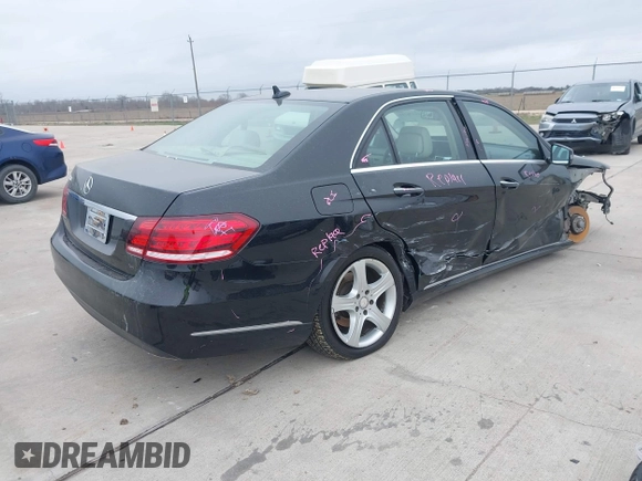 2014 Mercedes-Benz E-Class E 350 Sport with VIN WDDHF5KB2EA910687, listed as a IAAI auction lot 41576215 with 74,726 mi miles. Bid and sale history available at carsss.com. Image 4.