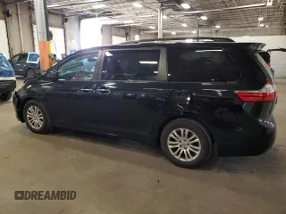 2016 Toyota Sienna XLE with VIN 5TDYK3DCXGS751715, listed as a Copart auction lot 58443105 with 160,155 mi miles and Salvage title. Bid and sale history available at DreamBid. Image 2.