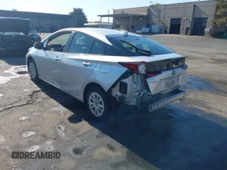 2021 Toyota Prius L Eco with VIN JTDKAMFU7M3142616, listed as a IAAI auction lot 42755833 with 40,542 mi miles and . Bid and sale history available at DreamBid. Image 3.