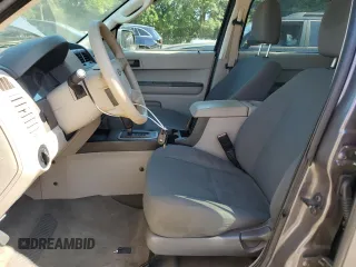 2009 Ford Escape XLS with VIN 1FMCU02749KA36136, listed as a Copart auction lot 64941875 with 171,576 mi miles and Clean title. Bid and sale history available at DreamBid. Image 7.
