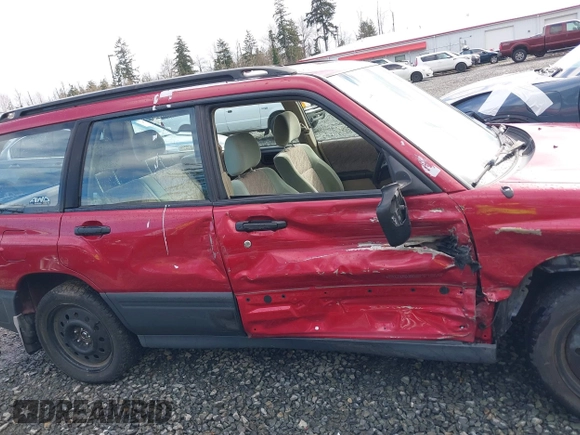 1999 Subaru Forester L with VIN JF1SF6357XH748358, listed as a IAAI auction lot 41885337 with 201,441 mi miles. Bid and sale history available at carsss.com. Image 14.