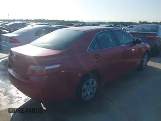 2007 Toyota Camry CE with VIN 4T1BE46K37U106127, listed as a IAAI auction lot 42088929 with 241,810 mi miles. Bid and sale history available at carsss.com. Image 4.