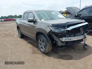 2022 Honda Ridgeline RTL-E with VIN 5FPYK3F74NB022568, listed as a IAAI auction lot 42624540 with 27,644 mi miles and . Bid and sale history available at DreamBid. Image 1.
