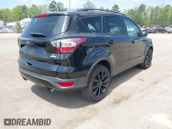 2017 Ford Escape SE with VIN 1FMCU0GD4HUE44010, listed as a IAAI auction lot 42093844 with 177,805 mi miles. Bid and sale history available at carsss.com. Image 4.