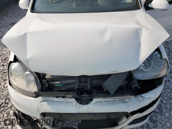 2009 Volkswagen GTI z VIN WVWFV71K29W121109, wystawiony jako Copart lot #70344254 z przebiegiem 102 475 mil mil oraz Szkoda całkowita • Salvage title. Historia ofert i sprzedaży dostępna na DreamBid. Obrazek 11.