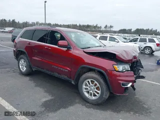 2019 Jeep Grand Cherokee Laredo E with VIN 1C4RJFAG2KC814154, listed as a IAAI auction lot 38877814 with 54,119 mi miles. Bid and sale history available at carsss.com. Image 1.