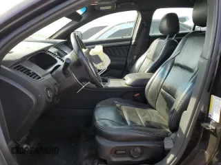 2014 Ford Taurus SEL with VIN 1FAHP2E88EG179093, listed as a Copart auction lot 50060975 with 198,096 mi miles and Salvage Title. Bid and sale history available at carsss.com. Image 7.