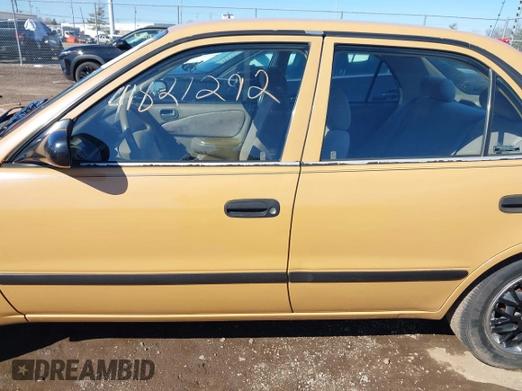 1999 Chevrolet Prizm z VIN 1Y1SK5284XZ400907, wystawiony jako IAAI lot #41821292 z przebiegiem 90 134 mil mil oraz . Historia ofert i sprzedaży dostępna na DreamBid. Obrazek 15.