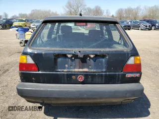 1991 Volkswagen GTI z VIN 3VWDB21G7MM023746, wystawiony jako Copart lot #66414904 z przebiegiem 105 926 mil mil oraz Nie do naprawy • Non repairable. Historia ofert i sprzedaży dostępna na DreamBid. Obrazek 6.