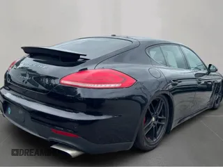 2016 Porsche Panamera 4 с VIN WP0AA2A71GL000493, выставлен на аукционе Copart как лот 61692925 с пробегом 84 384 миль миль и Чистый • Clean title. История ставок и продаж доступна на DreamBid. Изображение 4.