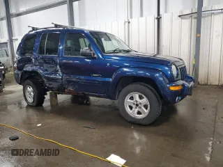 2004 Jeep Liberty Limited z VIN 1J4GL58KX4W101374, wystawiony jako Copart lot #51080895 z przebiegiem 288 747 mil mil oraz Szkoda całkowita • Salvage title. Historia ofert i sprzedaży dostępna na DreamBid. Obrazek 4.