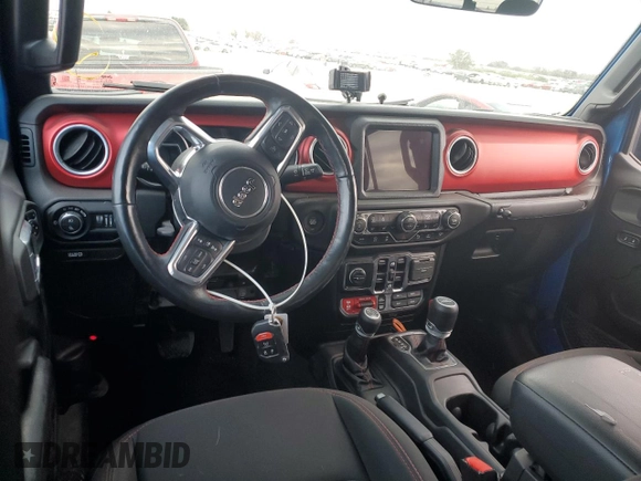 2021 Jeep Gladiator Rubicon with VIN 1C6JJTBM1ML611203, listed as a Copart auction lot 87203924 with 27,645 mi miles and Salvage title. Bid and sale history available at DreamBid. Image 8.