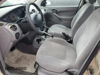 2001 Ford Focus LX with VIN 1FAFP33P51W267171, listed as a Copart auction lot 44200295 with 215,015 mi miles and Salvage Title. Bid and sale history available at carsss.com. Image 7.