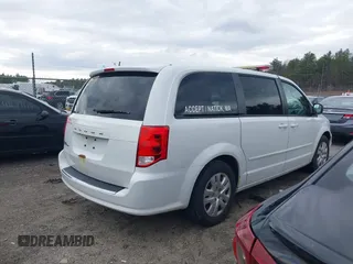 2015 Dodge Grand Caravan SE with VIN 2C4RDGBG2FR714404, listed as a IAAI auction lot 41860254 with 212,599 mi miles and . Bid and sale history available at DreamBid. Image 4.