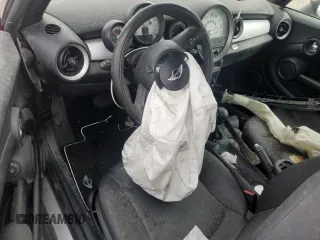 2012 MINI Convertible с VIN WMWZN3C56CT135341, выставлен на аукционе Copart как лот 48611575 с пробегом Не указан миль и Списание • Salvage title. История ставок и продаж доступна на DreamBid. Изображение 8.