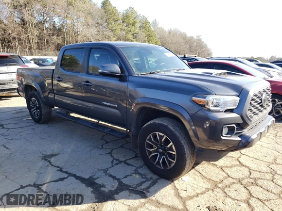 2021 Toyota Tacoma SR5 with VIN 3TMBZ5DN8MM031159, listed as a Copart auction lot 42495505 with 137,072 mi miles and Salvage title. Bid and sale history available at DreamBid. Image 4.