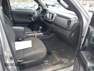 2016 Toyota Tacoma SR with VIN 5TFCZ5AN5GX026458, listed as a IAAI auction lot 41975246 with 208,401 mi miles and . Bid and sale history available at DreamBid. Image 5.