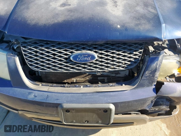 2005 Ford Freestyle SE z VIN 1FMZK01175GA28106, wystawiony jako Copart lot #56126035 z przebiegiem 121 936 mil mil oraz Szkoda całkowita • Salvage title. Historia ofert i sprzedaży dostępna na DreamBid. Obrazek 12.