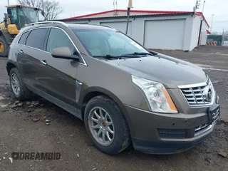 2015 Cadillac SRX Luxury Collection with VIN 3GYFNBE34FS521518, listed as a IAAI auction lot 41893073 with 82,700 mi miles and . Bid and sale history available at carsss.com. Image 1.