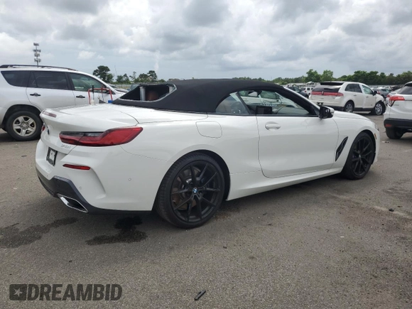 2024 BMW 8 Series 840i with VIN WBADZ4C08RCN02225, listed as a Copart auction lot 63132815 with 5,135 mi miles and Salvage title. Bid and sale history available at DreamBid. Image 3.