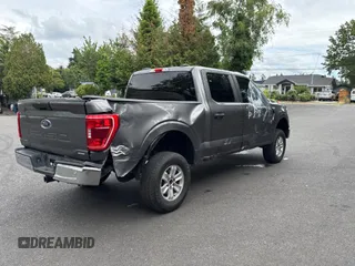 2021 Ford F-150 XL with VIN 1FTFW1E86MKD57397, listed as a Copart auction lot 62959355 with 59,227 mi miles and Salvage title. Bid and sale history available at DreamBid. Image 4.