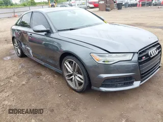 2016 Audi S6 Prestige z VIN WAUH2AFC1GN016187, wystawiony jako IAAI lot #42274744 z przebiegiem 169 821 mil mil oraz . Historia ofert i sprzedaży dostępna na DreamBid. Obrazek 1.