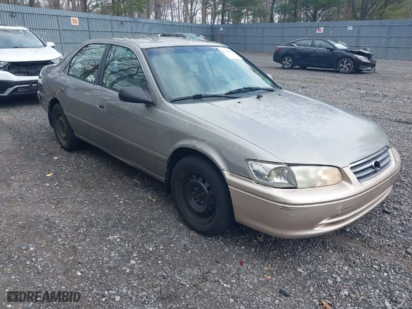 2001 Toyota Camry CE with VIN JT2BG22K710558243, listed as a IAAI auction lot 41954053 with 126,274 mi miles. Bid and sale history available at carsss.com. Image 1.