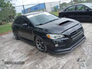 2016 Subaru WRX with VIN JF1VA1B65G9801044, listed as a IAAI auction lot 41973939 with 82,420 mi miles. Bid and sale history available at carsss.com. Image 1.