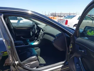 2009 Cadillac CTS RWD z VIN 1G6DU57V390157350, wystawiony jako IAAI lot #42306411 z przebiegiem 125 250 mil mil oraz . Historia ofert i sprzedaży dostępna na DreamBid. Obrazek 5.