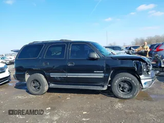 2002 Chevrolet Tahoe LT z VIN 1GNEC13Z02R203361, wystawiony jako IAAI lot #41580885 z przebiegiem 349 050 mil mil oraz . Historia ofert i sprzedaży dostępna na DreamBid. Obrazek 13.