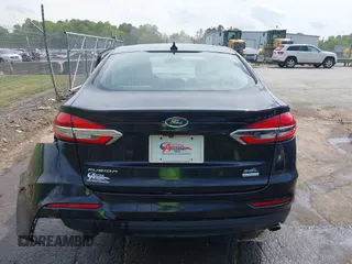 2019 Ford Fusion SEL with VIN 3FA6P0CD5KR182520, listed as a IAAI auction lot 42014190 with 107,028 mi miles and . Bid and sale history available at carsss.com. Image 16.