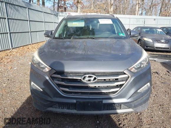 2016 Hyundai Tucson Sport with VIN KM8J33A21GU232747, listed as a IAAI auction lot 41443169 with 111,319 mi miles. Bid and sale history available at carsss.com. Image 12.
