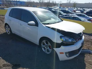 2010 Volkswagen GTI with VIN WVWHV7AJ3AW302532, listed as a IAAI auction lot 41794357 with 141,061 mi miles. Bid and sale history available at carsss.com. Image 1.