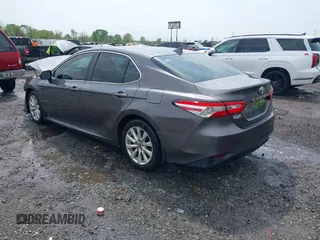 2020 Toyota Camry LE with VIN 4T1C11AK1LU328682, listed as a IAAI auction lot 41966816 with 172,334 mi miles and . Bid and sale history available at DreamBid. Image 3.