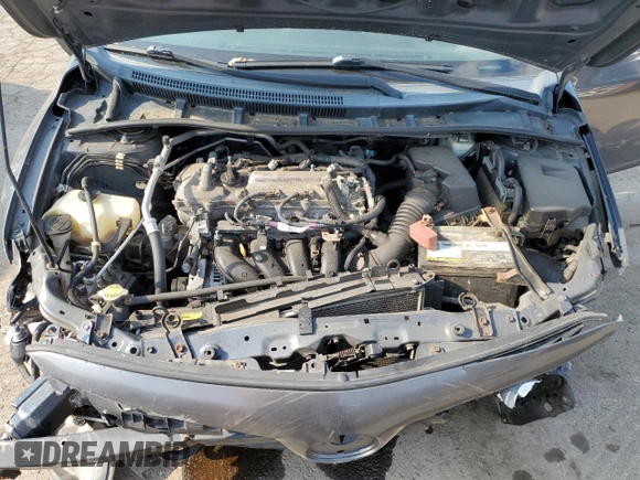 2012 Toyota Corolla L z VIN 2T1BU4EE2CC784314, wystawiony jako Copart lot #57239015 z przebiegiem 168 527 mil mil oraz Szkoda całkowita • Salvage title. Historia ofert i sprzedaży dostępna na DreamBid. Obrazek 11.